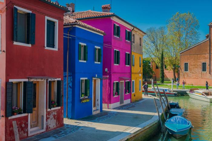 Brightly painted canalside houses, Island of Burano, Venetian Lagoon